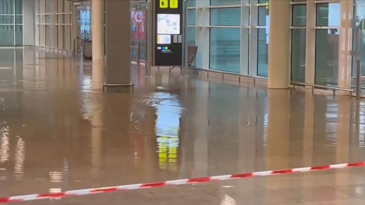 'Do not travel': Flights diverted as Barcelona warned of 'extreme danger' from rain - as Spain reels from floods