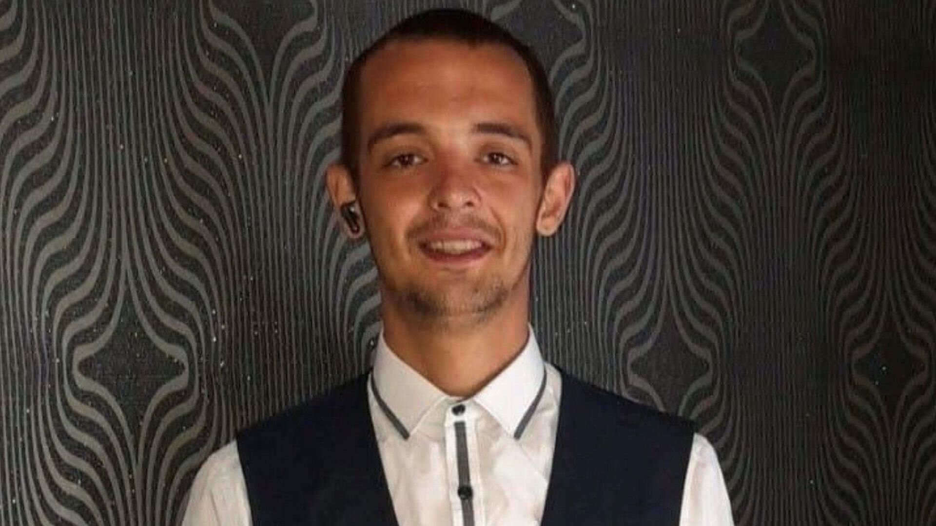 Man arrested after young father shot dead in home